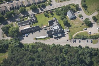 Oblique aerial view of Tongue Hotel, looking to the W.