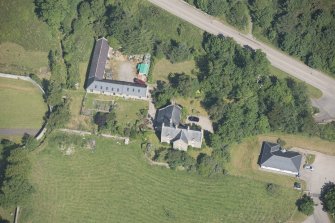 Oblique aerial view of Tongue manse and farmstead, looking to the ENE.