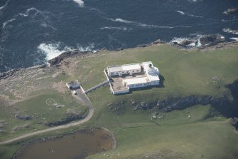 Oblique aerial view of Strathy Point Lighthouse, looking to the W.