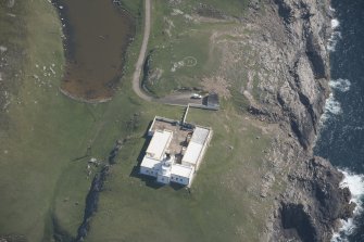 Oblique aerial view of Strathy Point Lighthouse, looking to the N.
