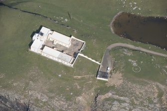 Oblique aerial view of Strathy Point Lighthouse, looking to the NE.