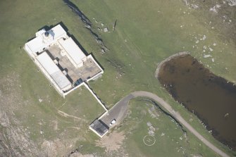 Oblique aerial view of Strathy Point Lighthouse, looking to the NNE.