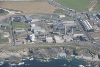 Oblique aerial view of Doureay Nuclear Research Facility, looking to the SE.