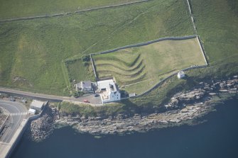 Oblique aerial view of Holborn head Lighthouse, looking to the NW.