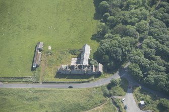 Oblique aerial view of Castletown Mill, looking to the SSW.