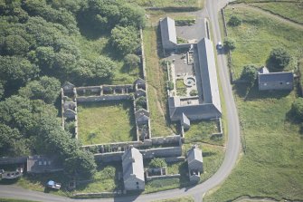 Oblique aerial view of Castlehill Pavement Works, looking to the SSW.