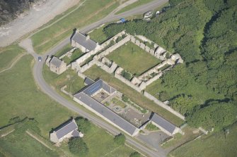 Oblique aerial view of Castlehill Pavement Works, looking to the NE.