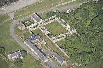 Oblique aerial view of Castlehill Pavement Works, looking to the NE.