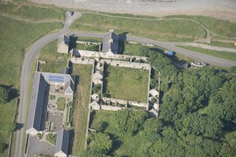 Oblique aerial view of Castlehill Pavement Works, looking to the NNE.