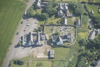 Oblique aerial view of Dunnet Church, looking to the SSW.