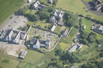 Oblique aerial view of Dunnet Church, looking to the S.