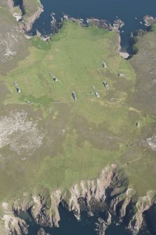 Oblique aerial view of Eilean Nan Ron township buildings, looking to the W.