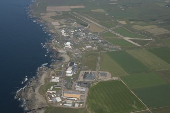 Oblique aerial view of Dounreay, Nuclear Research Facility and airfield, looking to the E.
