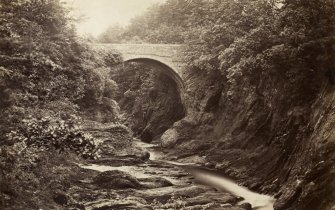 View of bridge. 
Titled: 'The Gaunachie Bridge at "The Burn".'
PHOTOGRAPH ALBUM No.4 : INNES OF COWIE ALBUM.