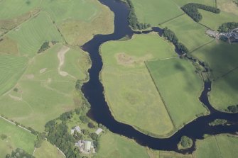 Oblique aerial view of the cropmarks of the enclosure on Lodge Island, looking NE.