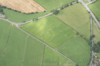 Oblique aerial view of the Twelve Apostles stone circle, looking NNE.