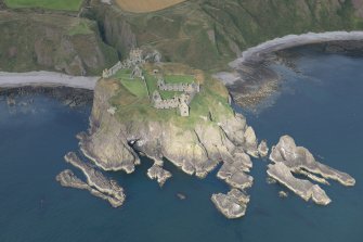 Oblique aerial view of Dunnottar Castle, looking WNW.