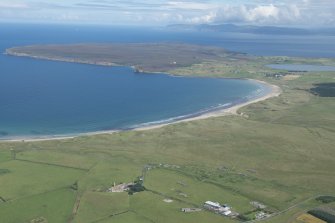 General oblique aerial view of Dunnet Bay with Dunnet Head and Hoy beyond, looking NW.
