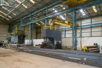 Interior. Central Yard Steel preparation workshop. View of Hugh Smith 600 Ton rolling machine and job crane (maximum plate width 9.14m, plant no. 5569) from North West.