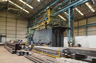 Interior. Central Yard, Steel preparation workshop, North Bay (1950s) East End. View of Hugh Smith 600 Tonne rolling machine with Paterson Hughes 3 Tonne jib crane.