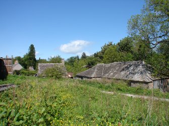 View of associated buildings from the south west, from a Standing Building Survey, Glamis Mill, Glamis, Angus.