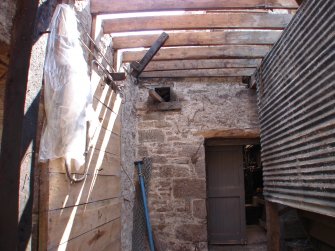 View of the door into the sawmill and the drive slot in the south gable, from a Standing Building Survey, Glamis Mill, Glamis, Angus.