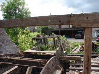 View of the waterwheel sluices and clutch, from the east, from a Standing Building Survey, Glamis Mill, Glamis, Angus.