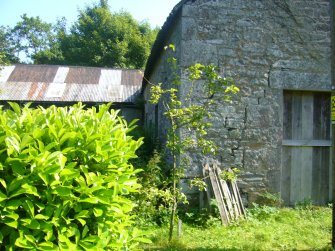 Exterior view of the mill showing an out-building to the rear, from a Standing Building Survey, Glamis Mill, Glamis, Angus.