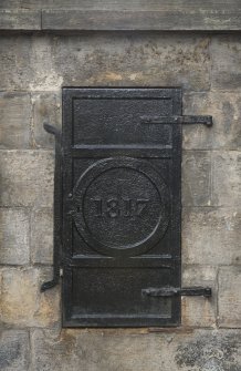 Detail of ironwork including date '1817', on Well, Queensberry House, 64 Canongate, Edinburgh.