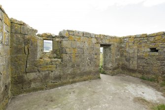 Interior of priory church. View showing window and doorway on south wall