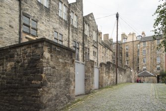 View of rear elevations of 2-26 St Mary's Street and 266-278 Canongate from Gullan's Close, Canongate, Edinburgh, from SE.