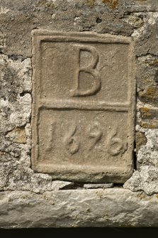 Detail of date plaque (1696).