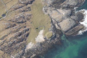 Oblique aerial view of Vaul, Dun Beag, Tiree, looking NW.