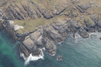 Oblique aerial view of Vaul, Dun Beag, Tiree, looking SW.