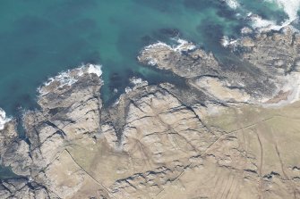 Oblique aerial view of Dun Boraige and Dun Moire, Tiree, looking NNE.