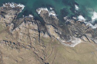 Oblique aerial view of Dun Boraige, Tiree, looking N.