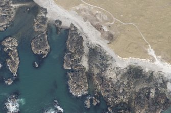 Oblique aerial view of Sandaig, Tiree, looking NE.