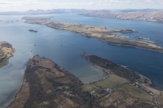 General oblique aerial view of Port Appin with Lismore, Loch Linnhe and Mull beyond, looking WSW.