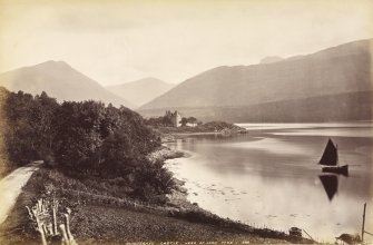 Distant view of Dunderave Castle from west, 
Titled: 'Dunderave Castle, Head of Loch Fyne.  888 J.V.'
PHOTOGRAPH ALBUM No. 33: COURTHAULD ALBUM