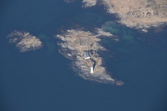 Oblique aerial view of Oronsay Lighthouse, looking WNW.