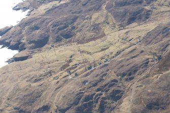 Oblique aerial view of Achnacarnin, looking SSE.