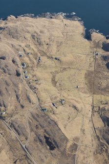 Oblique aerial view of Achnacarnin, looking NE.