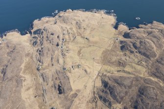 Oblique aerial view of Achnacarnin, looking NE.