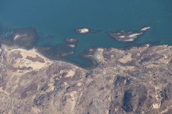 Oblique aerial view of the lazy beds and sheepfold, looking NNE.