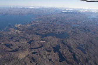General oblique aerial view of Loch Poll, with Eddrachillis Bay,Eilean an Achaidh, the site of the Drumbeg wreck and Quinag beyond, looking E.