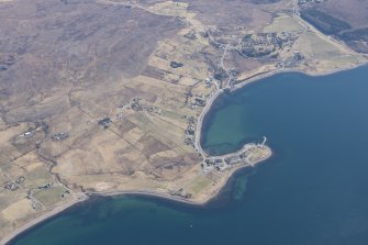 Oblique aerial view of Aultbea centred on the fish trap, looking ESE.