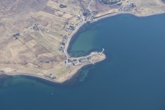 Oblique aerial view of Aultbea centred on the fish trap, looking E.