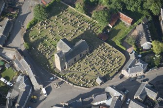 Oblique aerial view of St Serf's Church, looking NE.