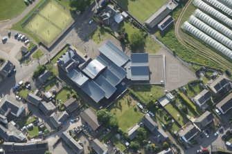 Oblique aerial view of Dunning Primary School, looking NW.