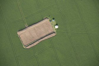 Oblique aerial view centred on the Glasgow University excavations at Leadketty, looking E.